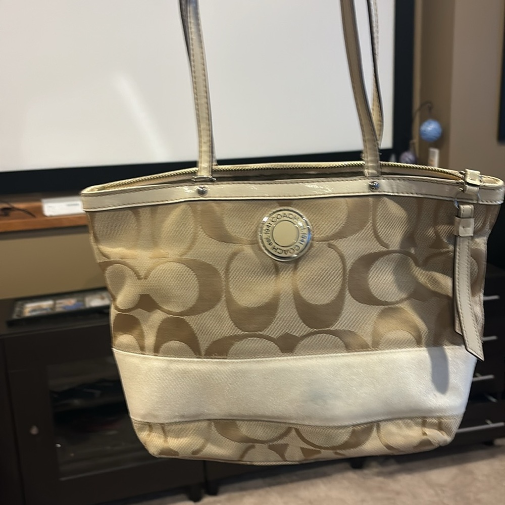 Coach purse with dust bag.
